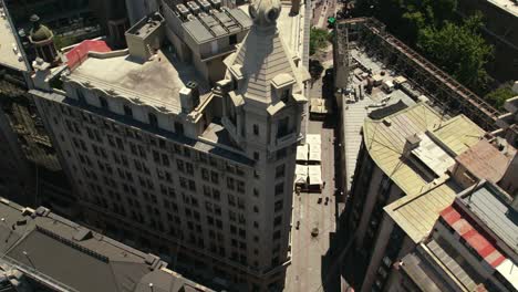Aerial-Panoramic-Drone-Above-Ariztia-Business-Center-Building-in-La-Bolsa,-Chile-Capital-City-of-Santiago