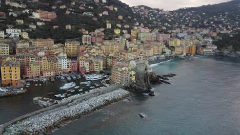 Camogli-coast,-Liguria,-in-Italy-with-clear-sea-in-winter-at-sunrise-and-aerial-view