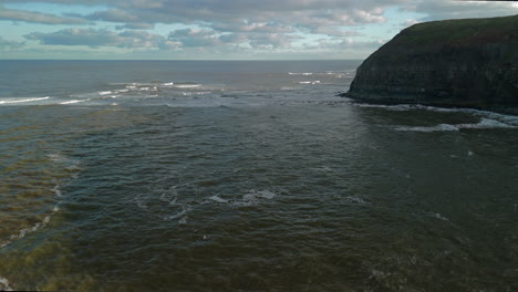 Establishing-Drone-Shot-Flying-Out-to-Sea-from-Staithes-Yorkshire-UK