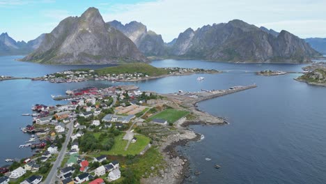 Reine-Village,-Islands-and-Mountains-in-Lofoten-Islands-Archipelago,-Norway,-Scandinavia---4k-Aerial-in-Summer