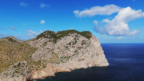 Rocky-Cliff,-Coast-And-Blue-Sea,-Aerial-Drone-Footage,-In-Mallorca
