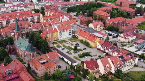 Red-rooftops-of-Elk-city-in-Poland,-aerial-drone-view
