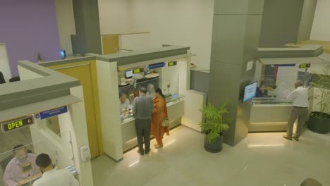 Drone-shot-of-employees-dealing-with-customers-in-an-office-in-Pakistan