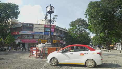 Wide-shot-of-Clock-tower-DB-road-street-view-and-traffic-RK-Puram