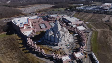 An-aerial-view-of-the-Shri-Swaminarayan-Mandir-in-Robbinsville-Twp,-NJ-on-a-sunny-day,-closed-for-the-day