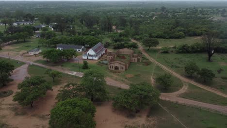 Drone-video-of-a-catholic-mission-school-church-at-a-village-in-Midlands,-Zimbabwe