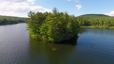 A-spectacular-4K-drone-shot-over-Parker-Pond-and-Pleasant-Lake,-located-in-Casco,-Maine,-USA