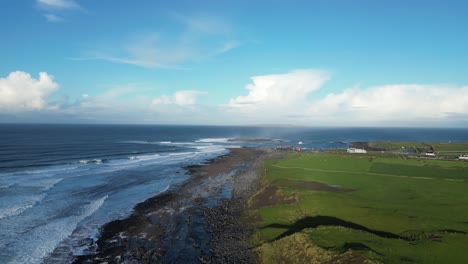 Slow-establishing-shot-of-waves-crashing-on-Doolin-bay-in-Ireland