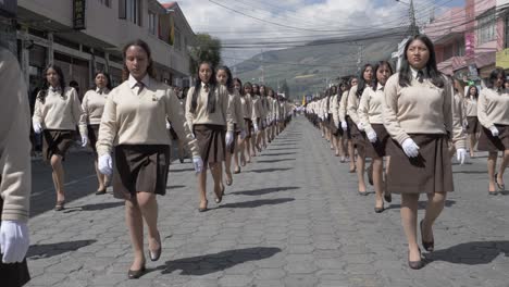 Formation-brown-uniform-girls-march-street-parade-towns-Independence-day