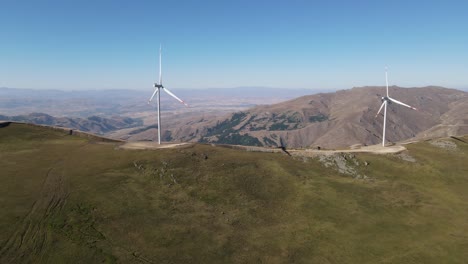 Drone-view-of-modern-wind-turbine-producing-clean-and-renewable-energy-in-the-countryside