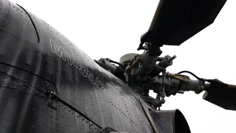 Close-up-of-attack-helicopter-rotor-blade-system-and-artistic-fuselage