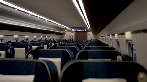 Inside-View-Of-Empty-Green-Car-Class-Hokuriku-Shinkansen-Bullet-Train