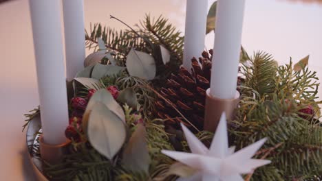 Placing-Candles-in-Christmas-Advent-Wreath
