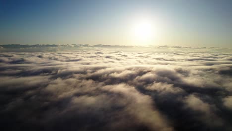 Sunlight-Over-Sea-Of-Clouds-At-Dawn