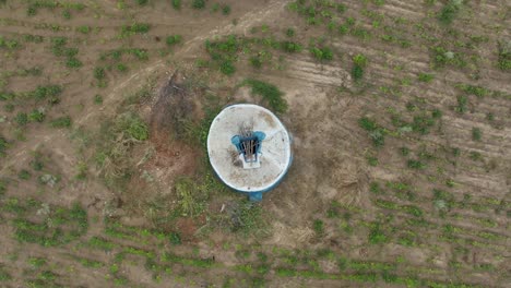 Aerial-top-shot-of-abandoned-well-in-a-barren-land-of-Tharparkar-in-Pakistan