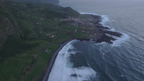 Flying-above-coastal-town-Fajã-Grande-in-Azores---drone-shot