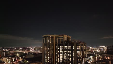 Fort-Worth,-Texas-skyline-at-night-with-drone-video-panning-right-to-left-close-up