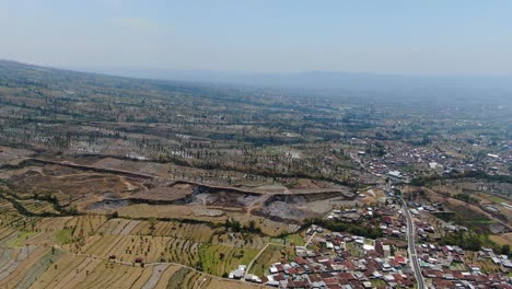 Agriculture-fields-and-small-villages-in-Indonesia,-aerial-view