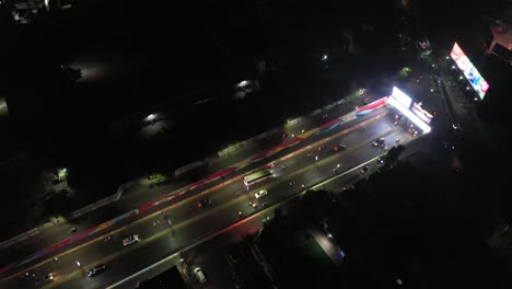 Rajkot-aerial-drone-view-of-many-vehicles-passing-through-the-under-bridge-towards-the-race-course