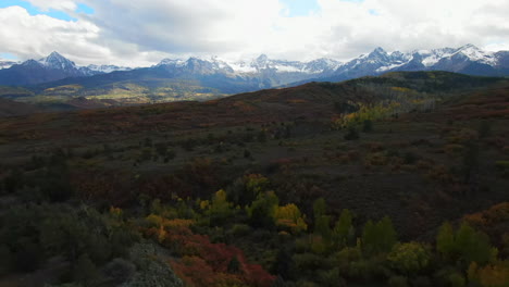 Colorful-Colorado-Million-Dollar-Highway-Mount-Sniffels-Wilderness-Dallas-Range-aerial-cinematic-drone-cloudy-autumn-fall-colors-San-Juans-Ridgway-Ralph-Lauren-Ranch-14er-forward-motion