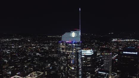 Los-Angeles-CA-USA,-Aerial-View-of-Wilshire-Grand-Center-Skyscraper-and-Downtown-at-Night