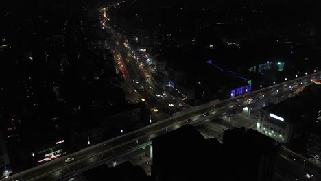 Rajkot-aerial-drone-view-many-vehicles-are-going-and-big-buildings-are-visible-around