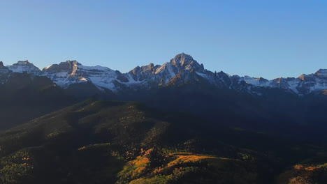Mount-Sniffels-Dallas-Range-Colorado-aerial-cinematic-drone-autumn-fall-colors-San-Juans-Ridgway-Telluride-Ralph-Lauren-Ranch-14er-Million-Dollar-Highway-Rocky-Mountains-morning-zoom-circle-right