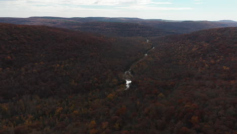 Panoramic-Aerial-View-Of-Autumn-Forest-In-Lee-Creek-Park-Near-West-Fork-In-Washington-County,-Arkansas