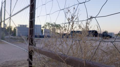 Wire-fence-with-dry-dead-weeds-in-Australian-outback-town