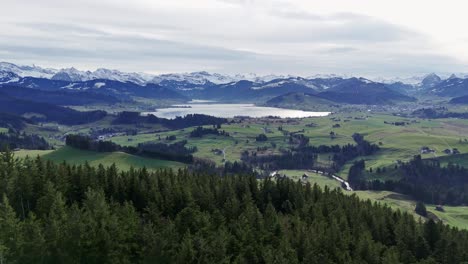 Picturesque-Swiss-valley-Einsiedeln-and-lake-Sihlsee,-snowy-alpine-in-Switzerland,-famous-tourist-destination