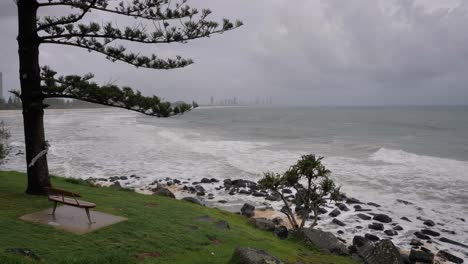 Burleigh-Heads,-Gold-Coast-02-January-2024---Rain-and-storms-at-Burleigh-Heads-looking-North-to-Surfers-Paradise-on-the-Gold-Coast