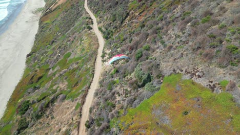 paragliding-flight-in-cachagua-beach-region-of-valparaiso,-country-of-chile