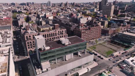 Establishing-drone-shot-of-modern-city-residential-neighbourhood,-skyline-buildings-and-cityscape,-USA