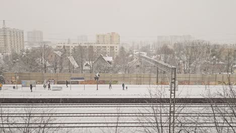 Time-lapse-of-a-cold-winter-day-on-a-small-railway-station-in-Gdansk,-Poland