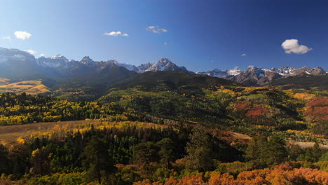 Colorful-Colorado-Mount-Sniffels-Dallas-Range-aerial-cinematic-drone-sunny-morning-autumn-fall-colors-San-Juans-Ridgway-Ralph-Lauren-Ranch-14er-Million-Dollar-Highway-Rocky-Mountains-upward-motion