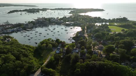 Drone-shot-of-the-Woods-Hole-Eel-Pond,-a-safe-refuge-for-boats-in-Cape-Cod