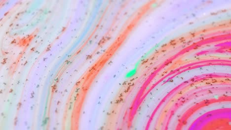 Close-up-abstract-video-of-multicolored-paints-flowing-and-getting-mixed