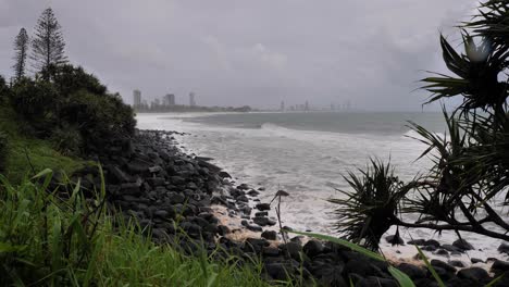 Burleigh-Heads,-Gold-Coast-02-January-2024---Rain-and-storms-at-Burleigh-Heads-looking-towards-Surfers-Paradise-on-the-Gold-Coast