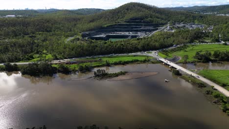 Oxenford,-Gold-Coast,-4-January-2024---Aerial-views-of-the-Coomera-River-approaching-the-Oxenford-Quarry