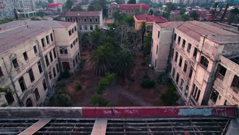 Dolly-in-bird's-eye-view-of-the-internal-area-of-the-abandoned-former-maternity-ward-of-the-Barros-Luco-hospital,-Santiago-Chile