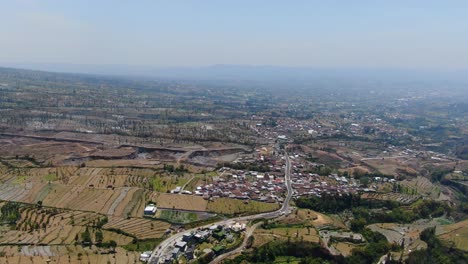 Vast-landscape-with-small-villages-in-Indonesia,-aerial-view