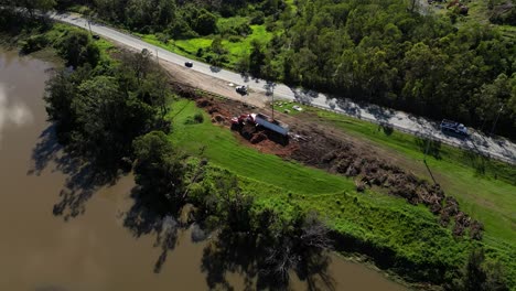 Oxenford,-Gold-Coast,-4-January-2024---Aerial-view-of-the-clean-up-process-adjacent-to-the-Coomera-River-from-storms-on-the-Gold-Coast-January-2024
