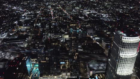 Downtown-Los-Angeles-CA-USA-Traffic-and-Buildings-at-Night,-Aerial-View