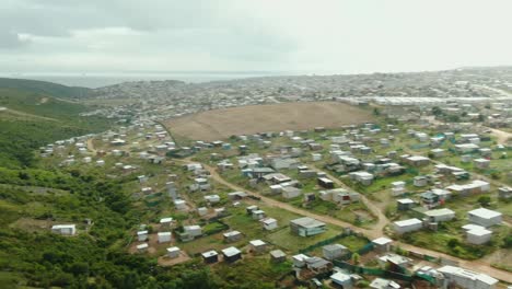 Drone-aerial-of-huge-informal-settelment-at-a-small-coastal-town-in-South-Africa
