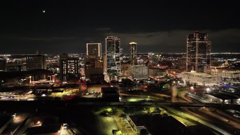 Fort-Worth,-Texas-skyline-at-night-with-drone-video-moving-in-a-circle-wide-shot