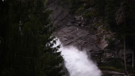 Slow-mo,-aqueous-masterpiece,-water-crashes-over-rocks,-Austrian-countryside