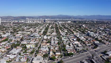 Mid-City,-Central-Los-Angeles-Neighborhood,-California-USA,-Drone-Shot-of-Cityscape,,-Homes-and-Streets