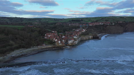 Wide-Angle-Aerial-Shot-of-Robin-Hood's-Bay-Village-on-Overcast-Day-UK