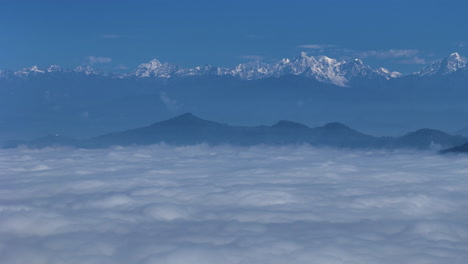 Heavenly-mountain-range-drone-shot-from-clouds-above-the-Dhulikhel-Nepal-4K