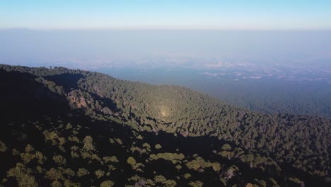 Aerial-flyover-La-Malinche-Forest-Volcano-in-Puebla-during-sunset-time-in-Mexico